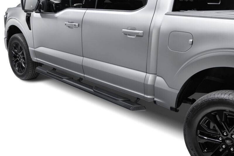 RealTruck 15-26 Ford F150 Super Crew / 17-26 F250/F350 SD Super Cab Traxio 4in Nerf Bars - Tex. Blk