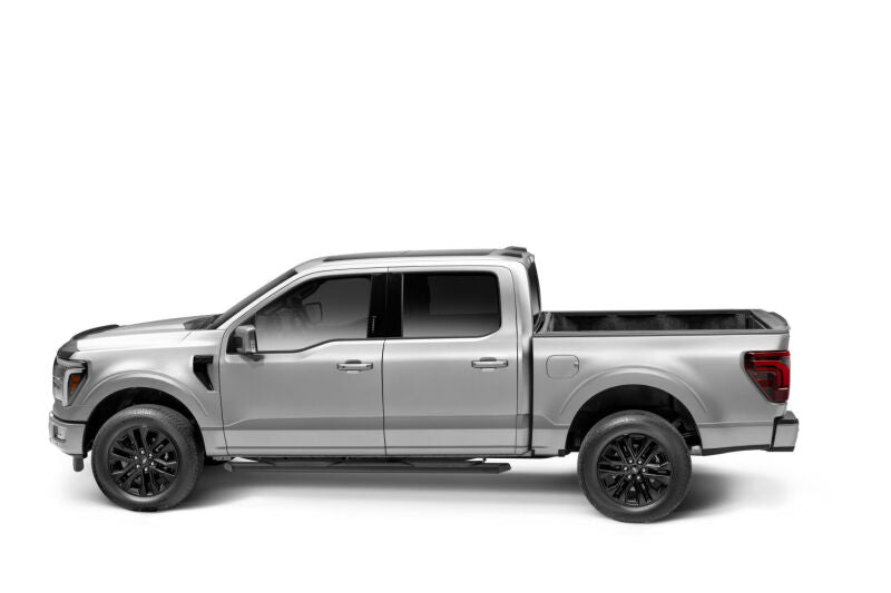 RealTruck 15-26 Ford F150 Super Crew / 17-26 F250/F350 SD Super Cab Traxio 4in Nerf Bars - Tex. Blk