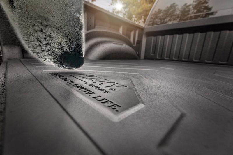 Husky Liners 19-23 Silverado/Sierra 1500 69.9 Bed Heavy Duty Bed Mat - Order Your Parts - اطلب قطعك