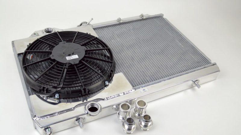 CSF 96-07 Mitsubishi Evo 4/5/6/7/8/9 Full-Slim Radiator w/12in Fan & Shroud/-16AN & Slip On Fitting - Order Your Parts - اطلب قطعك